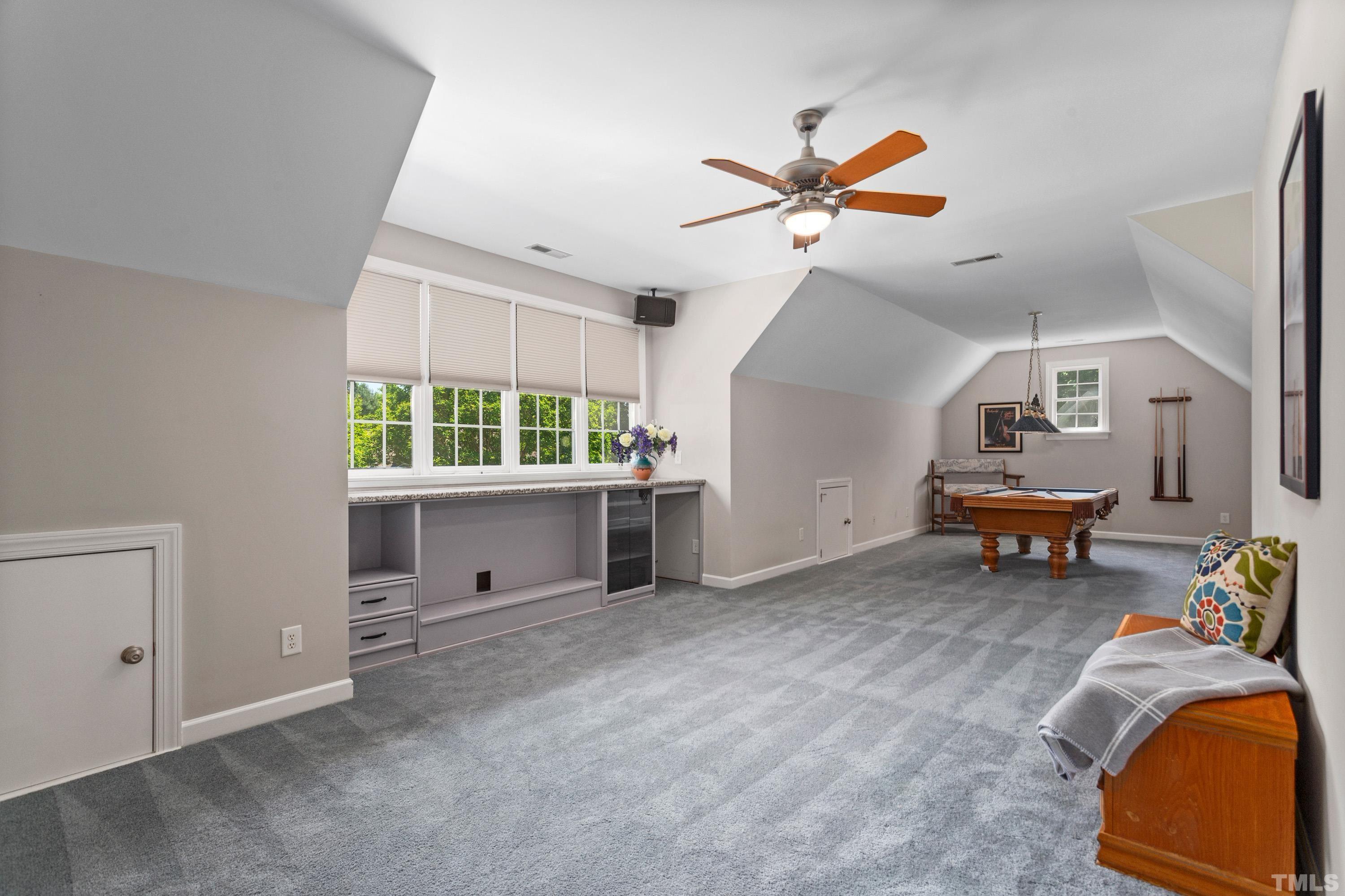 3728 Grandbridge Drive Apex, NC 27539 - Photo 48 of 76 a living room with furniture and a window