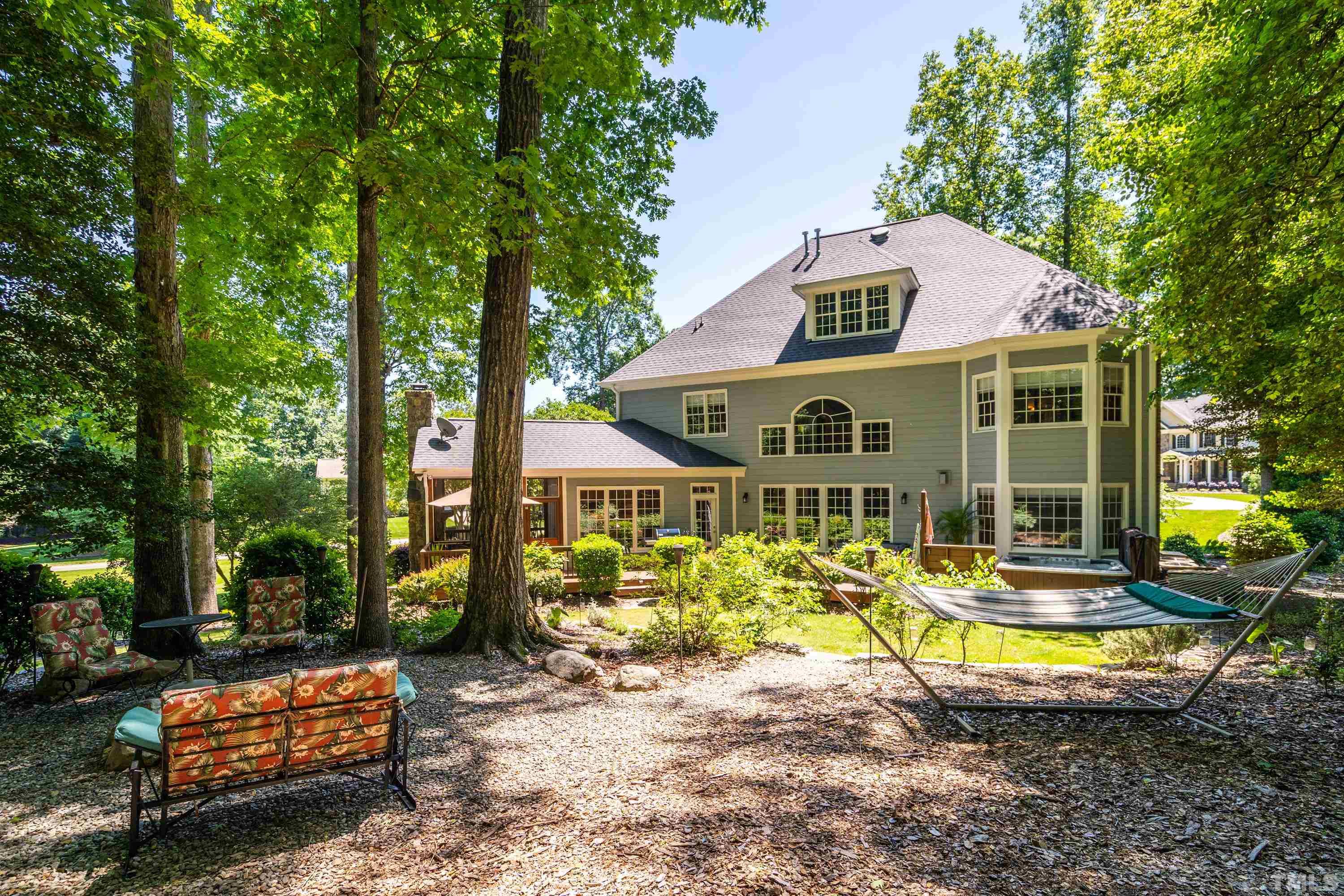 3728 Grandbridge Drive Apex, NC 27539 - Photo 54 of 76 a view of a house with swimming pool and sitting area
