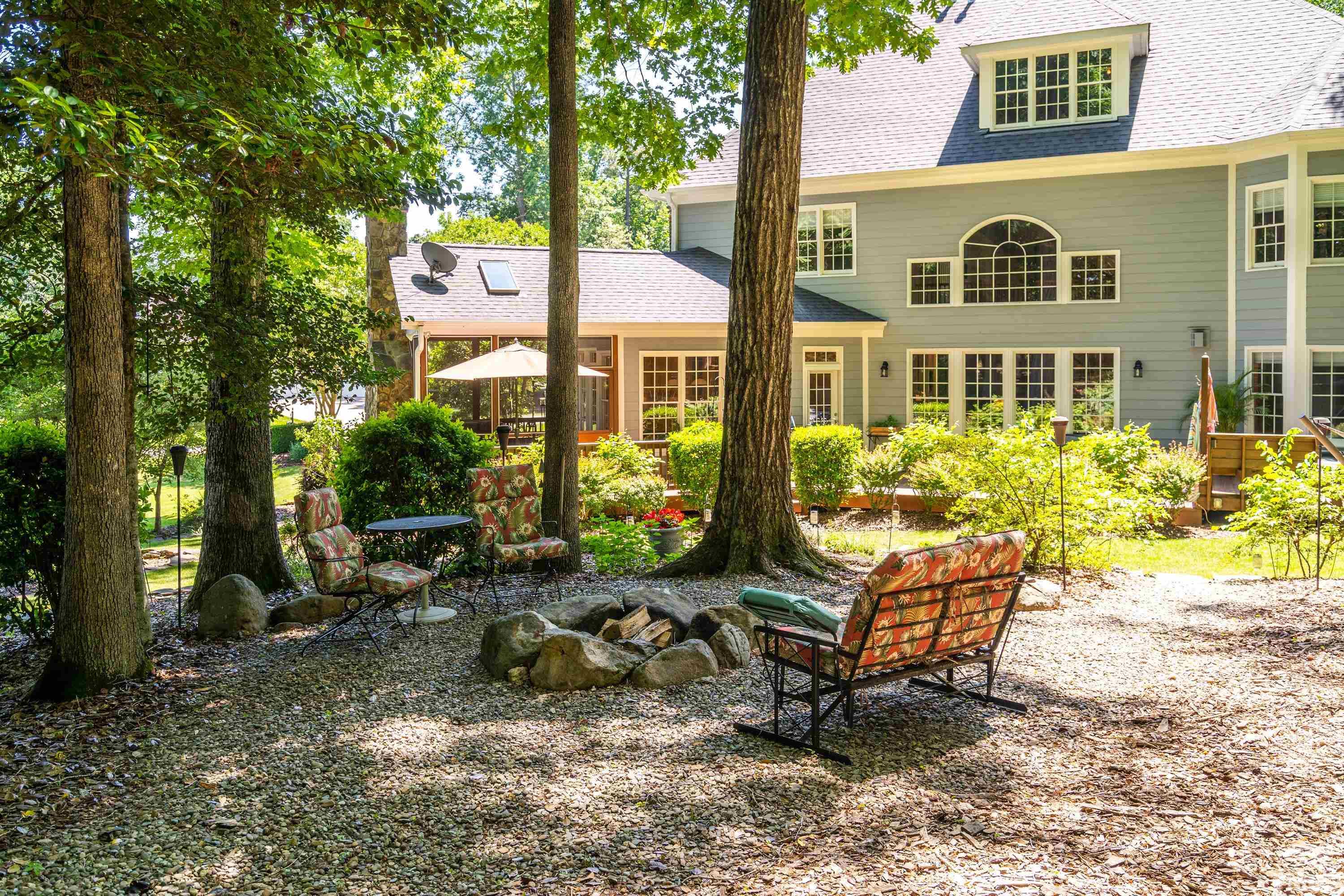 3728 Grandbridge Drive Apex, NC 27539 - Photo 55 of 76 a view of a chairs in a backyard