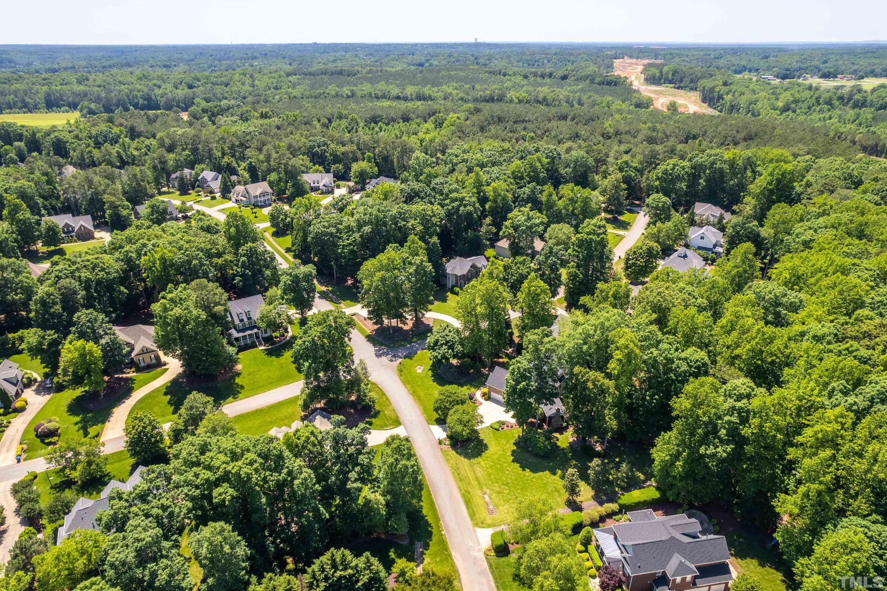 3728 Grandbridge Drive Apex, NC 27539 - Photo 62 of 76 an aerial view of a houses with a yard