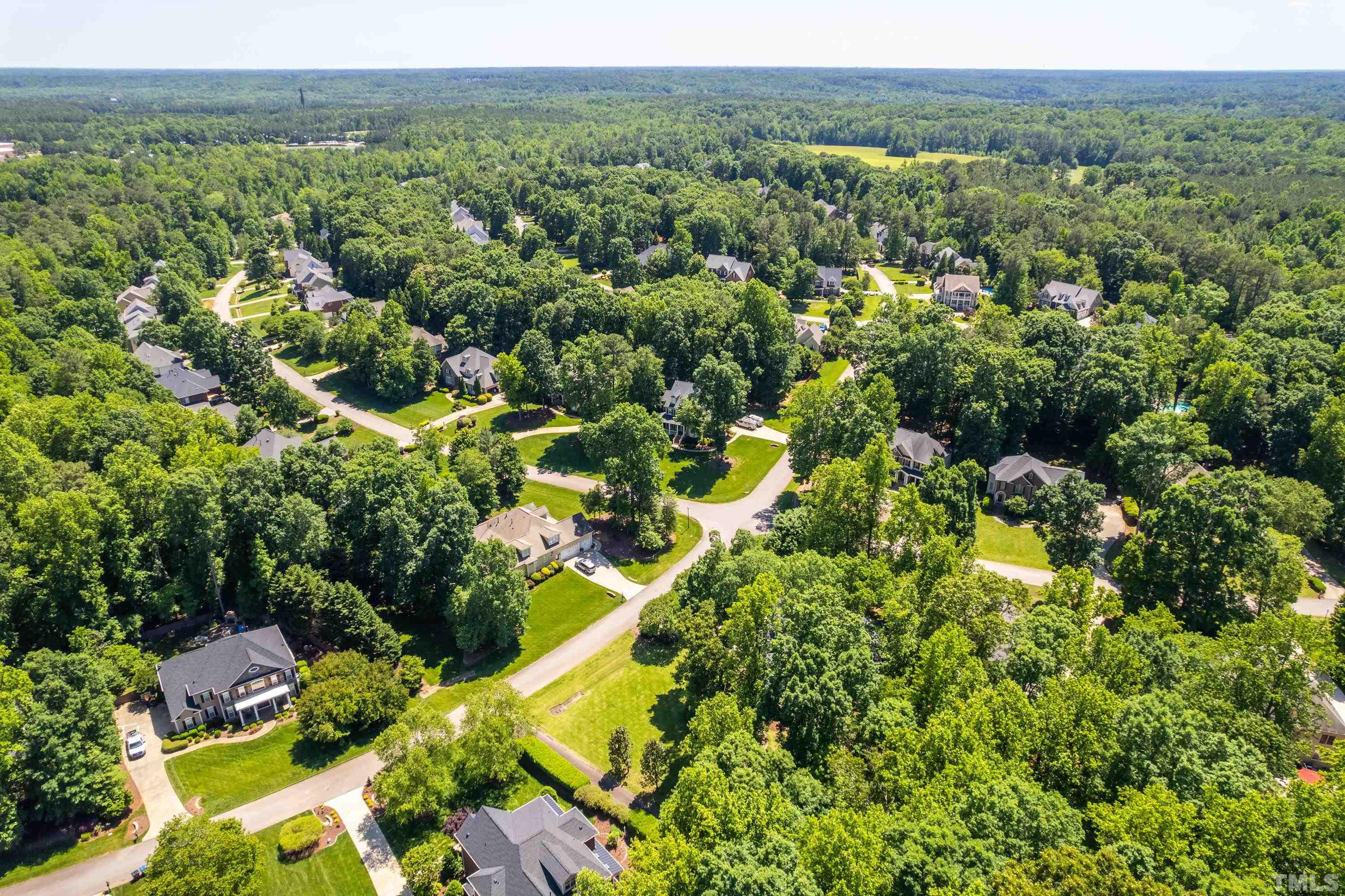 3728 Grandbridge Drive Apex, NC 27539 - Photo 63 of 76 an aerial view of residential houses with outdoor space and trees