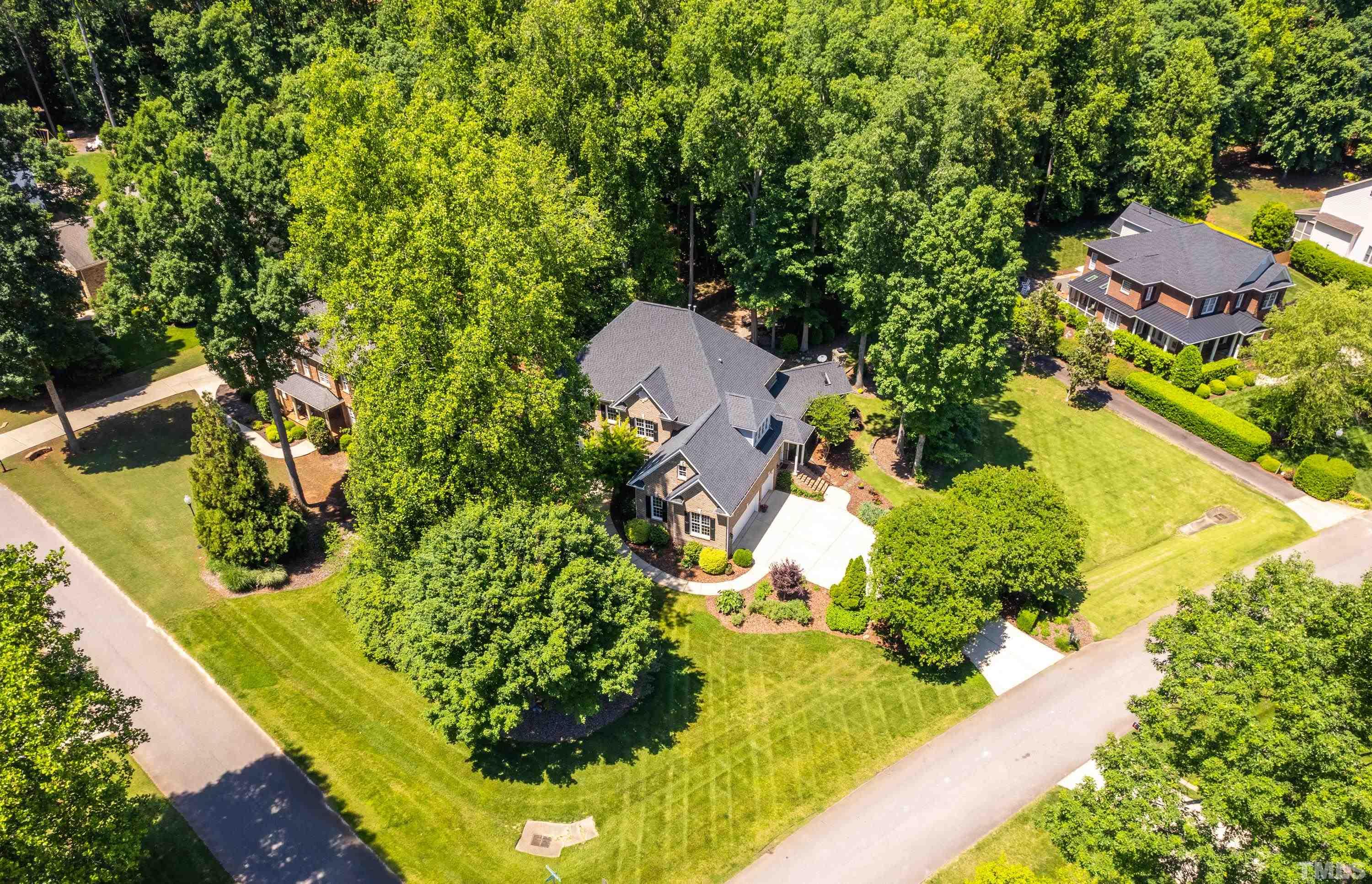 3728 Grandbridge Drive Apex, NC 27539 - Photo 8 of 76 an aerial view of a house with a yard basket ball court and outdoor seating