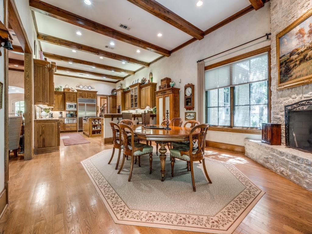 4420 Park Lane Dallas, TX 75220 - Photo 16 of 40 a dining room with furniture a rug and a chandelier