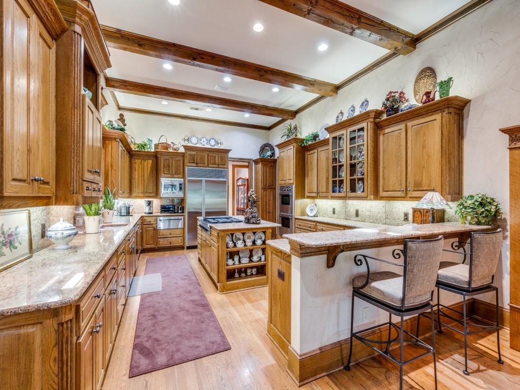 4420 Park Lane Dallas, TX 75220 - Photo 18 of 40 a dining hall with stainless steel appliances granite countertop a sink and a refrigerator