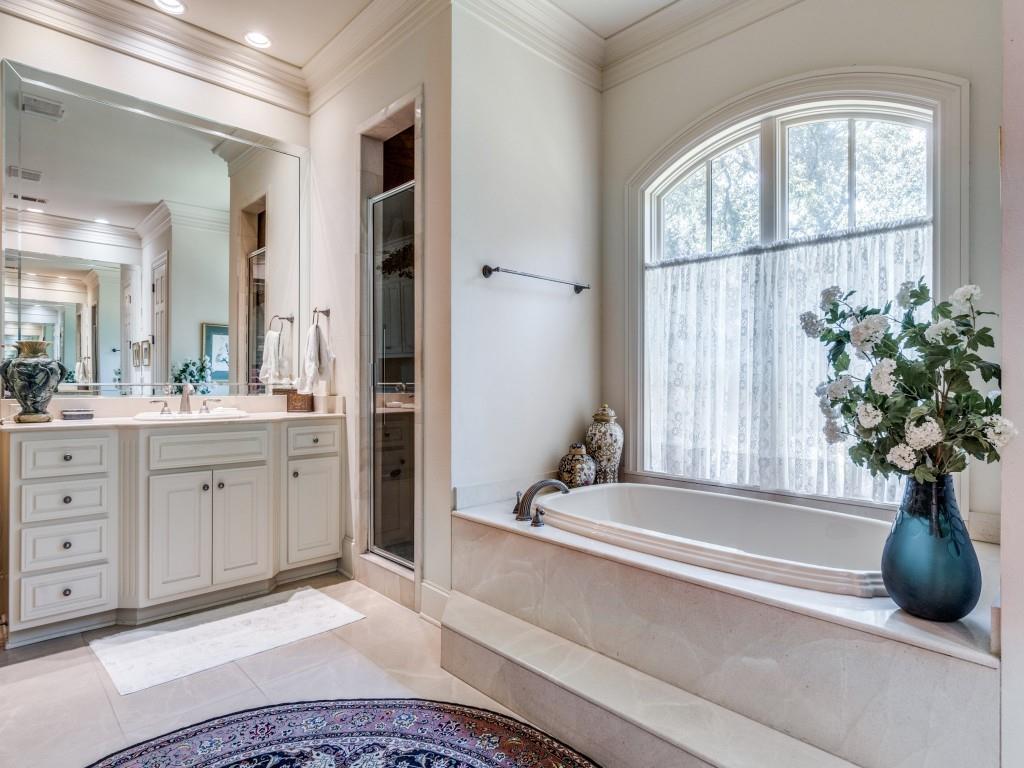 4420 Park Lane Dallas, TX 75220 - Photo 23 of 40 a spacious bathroom with a tub and shower