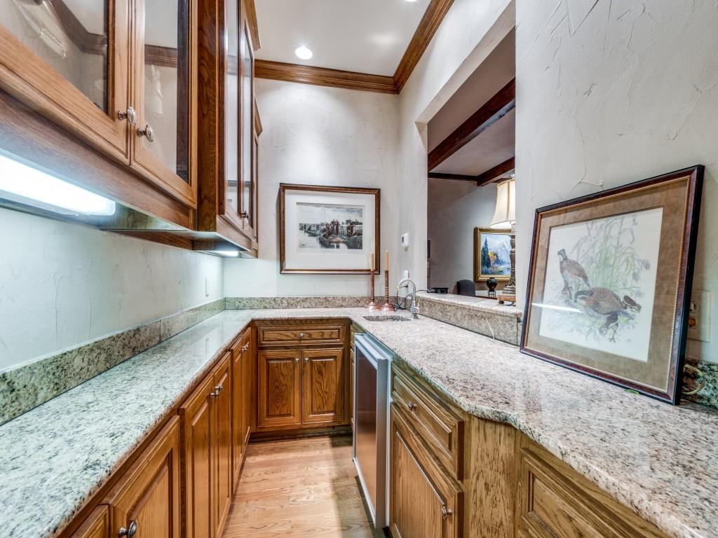 4420 Park Lane Dallas, TX 75220 - Photo 24 of 40 a view of a kitchen cabinets a sink and dishwasher