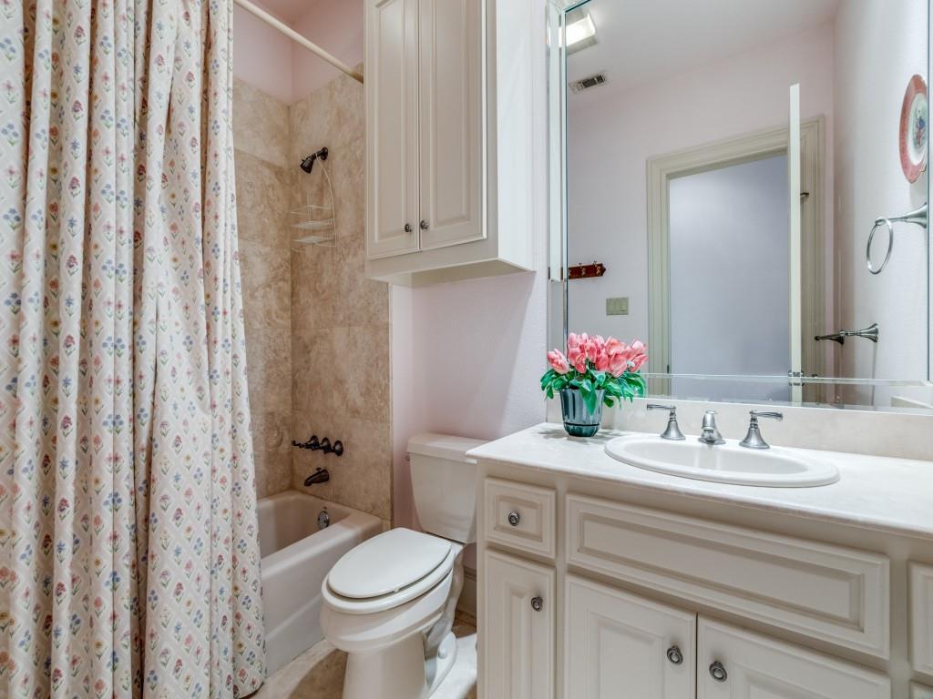 4420 Park Lane Dallas, TX 75220 - Photo 29 of 40 a bathroom with a sink toilet and shower