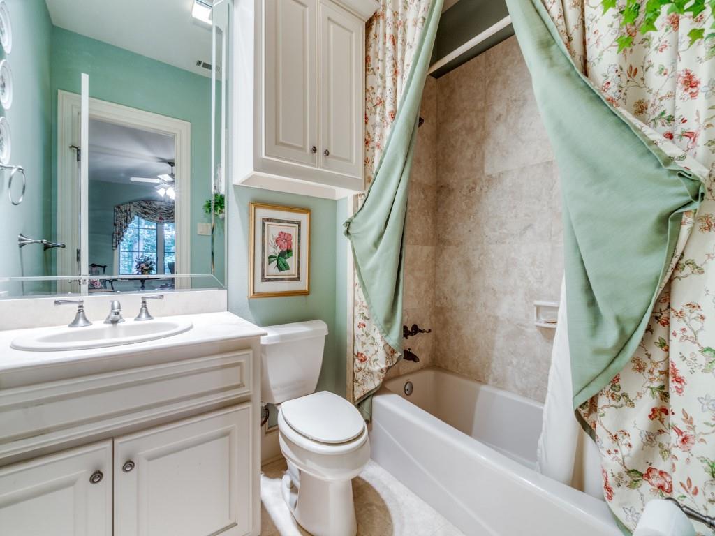 4420 Park Lane Dallas, TX 75220 - Photo 31 of 40 a bathroom with a sink a toilet and a bathtub