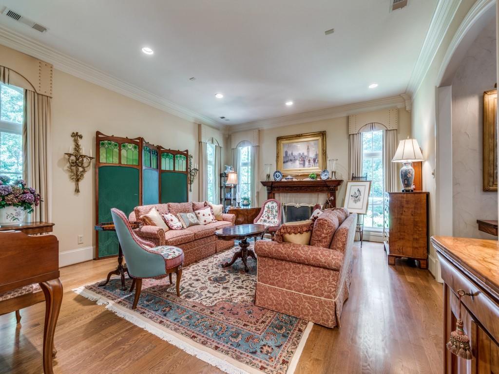 4420 Park Lane Dallas, TX 75220 - Photo 6 of 40 a living room with fireplace furniture and a wooden floor