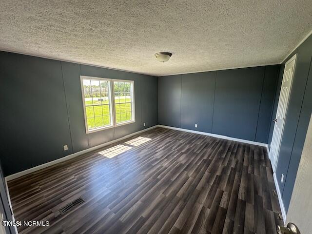 83 Ridge Lane Autryville, NC 28318 - Photo 7 of 13 a view of an empty room with wooden floor and a window