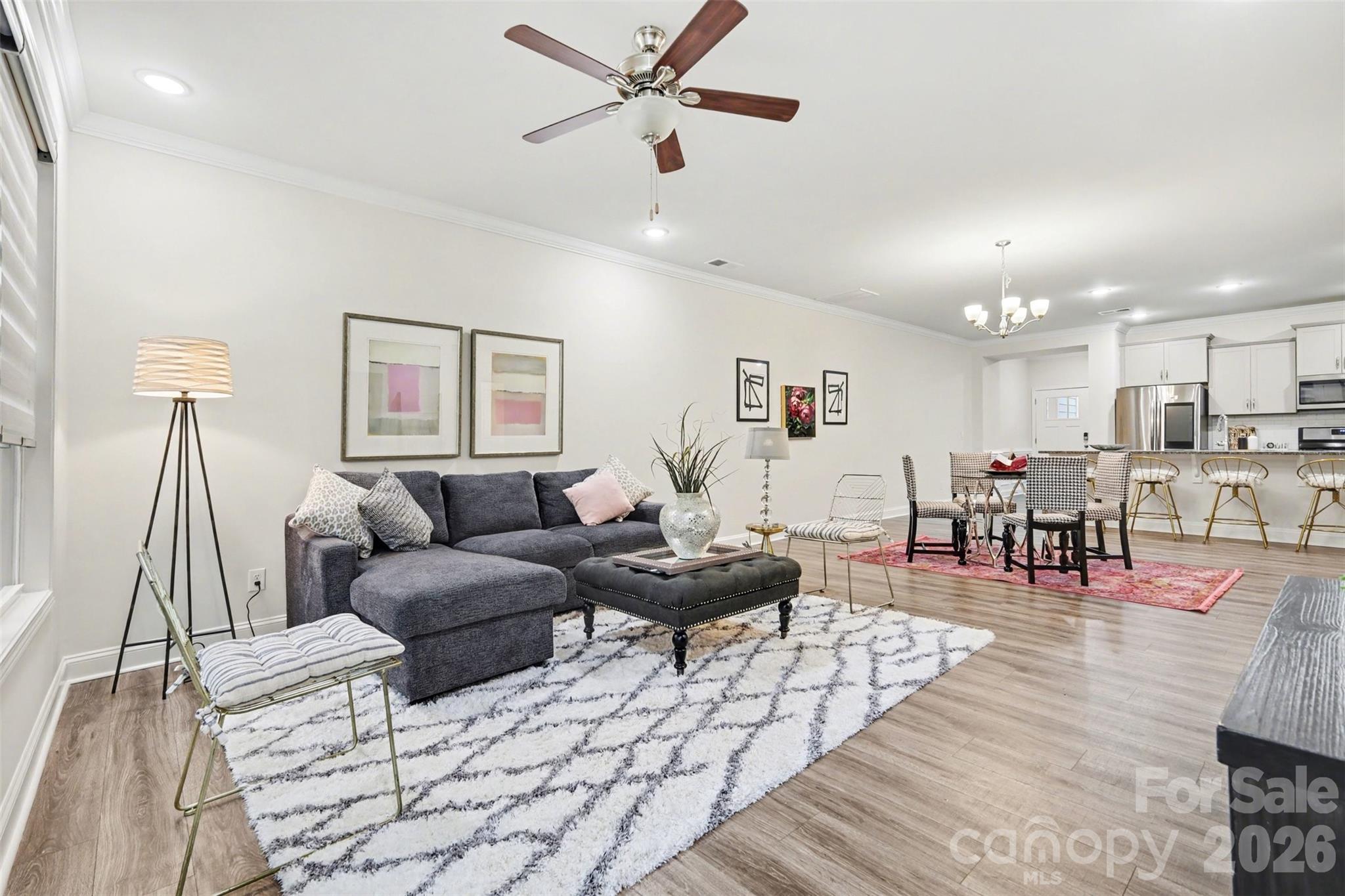 4293 Plumeria Way Fort Mill, SC 29707 - Photo 11 of 33 a living room with furniture and kitchen view