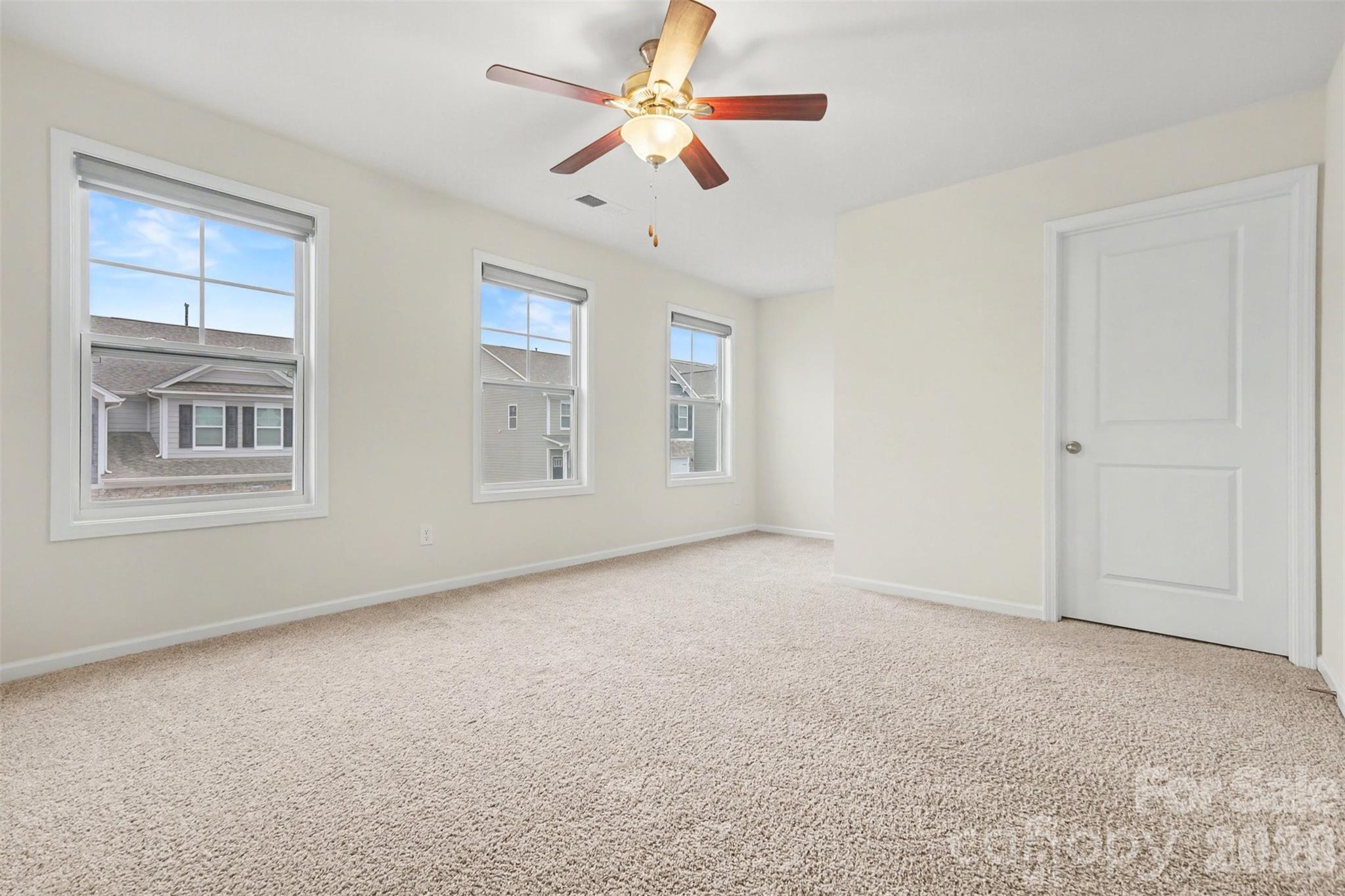 4293 Plumeria Way Fort Mill, SC 29707 - Photo 15 of 33 a view of an empty room with a window