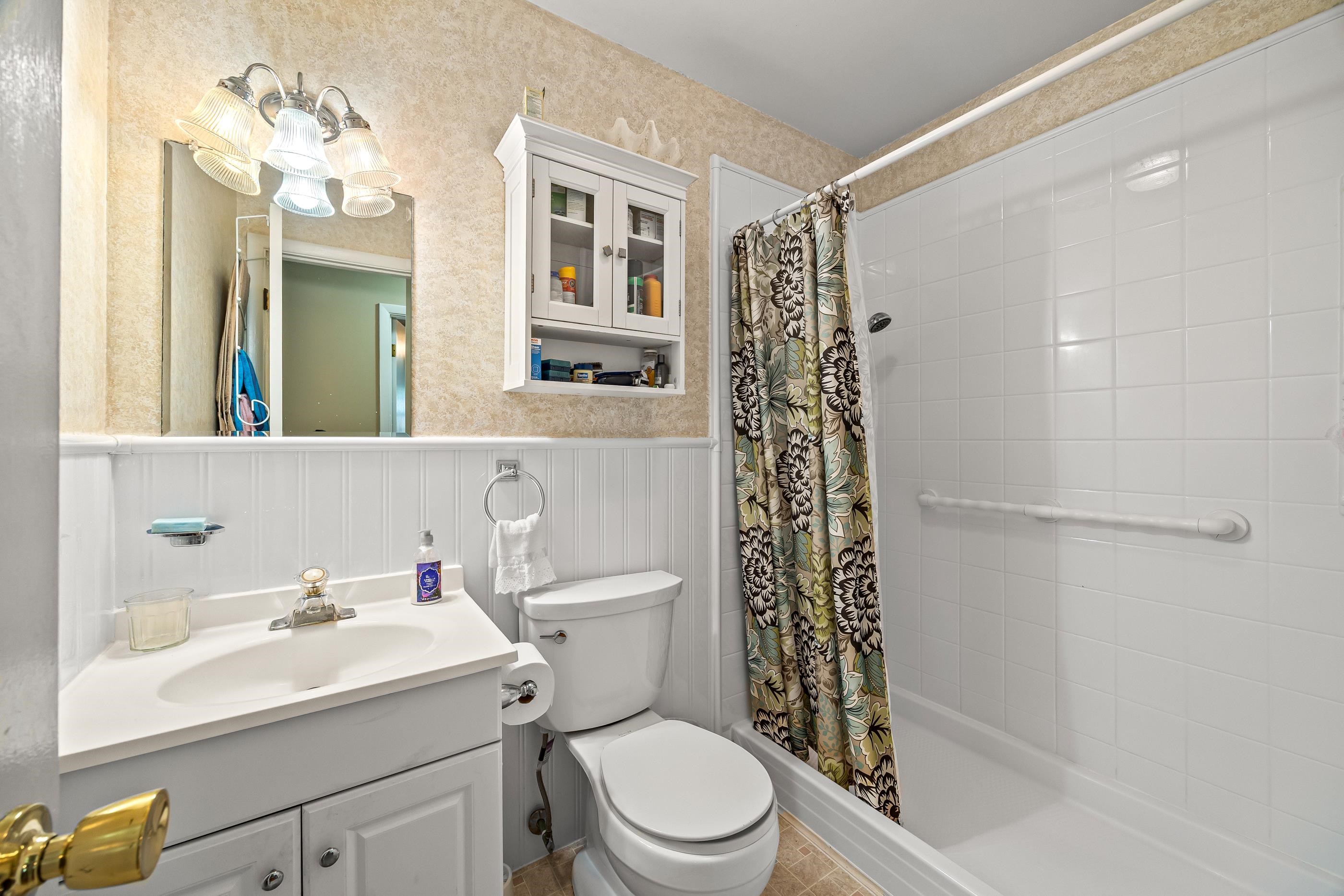 208 Tuxedo Road Staunton, VA 24401 - Photo 28 of 46 a bathroom with a sink a toilet and shower
