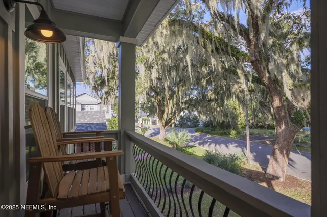 a view of a porch and a yard