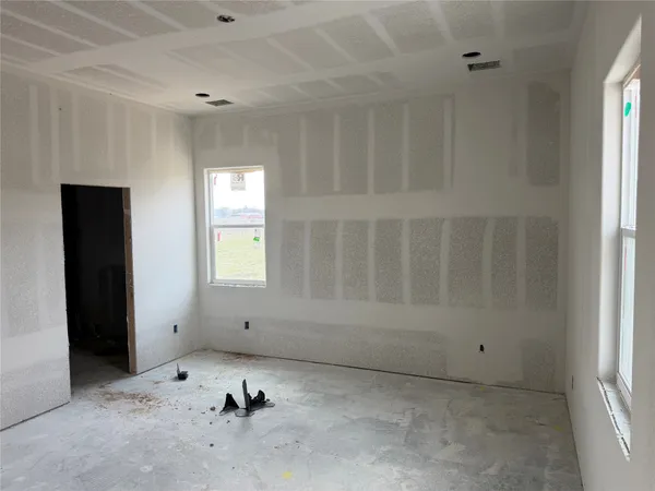 a view of a room with a window