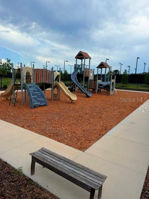 6259 Back Forty Loop Zephyrhills, FL 33541 - Photo 19 of 22 a view of a terrace with chairs