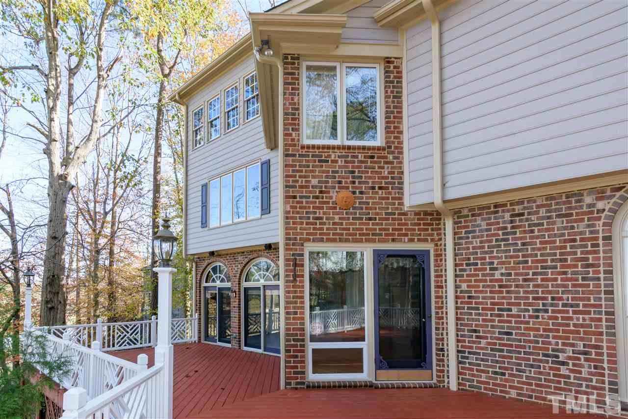 2808 Combe Hill Trail Raleigh, NC 27613 - Photo 3 of 30 a view of brick building with large windows