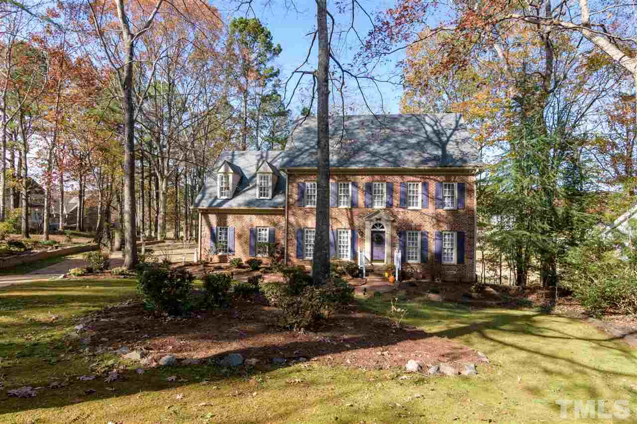 2808 Combe Hill Trail Raleigh, NC 27613 - Photo 28 of 30 a front view of a house with a yard table and chairs