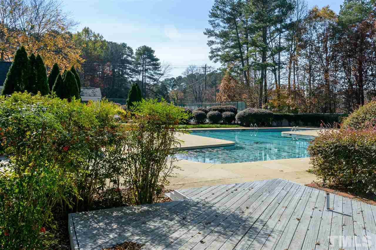2808 Combe Hill Trail Raleigh, NC 27613 - Photo 30 of 30 a view of a yard with plants and large trees