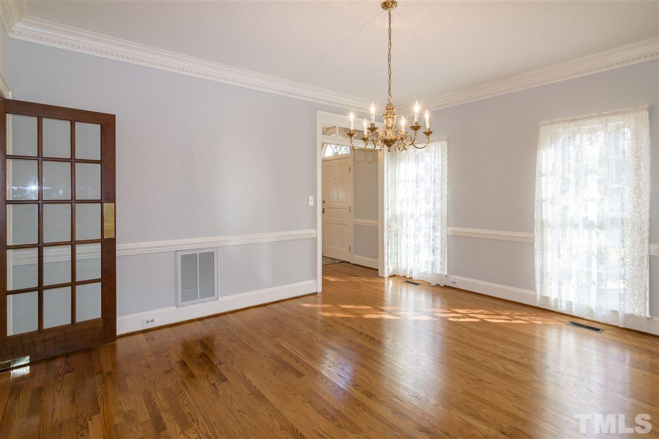 2808 Combe Hill Trail Raleigh, NC 27613 - Photo 8 of 30 a view of livingroom with hardwood floor and window