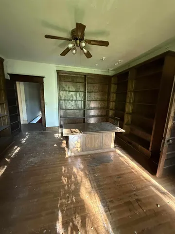 a view of an empty room and window