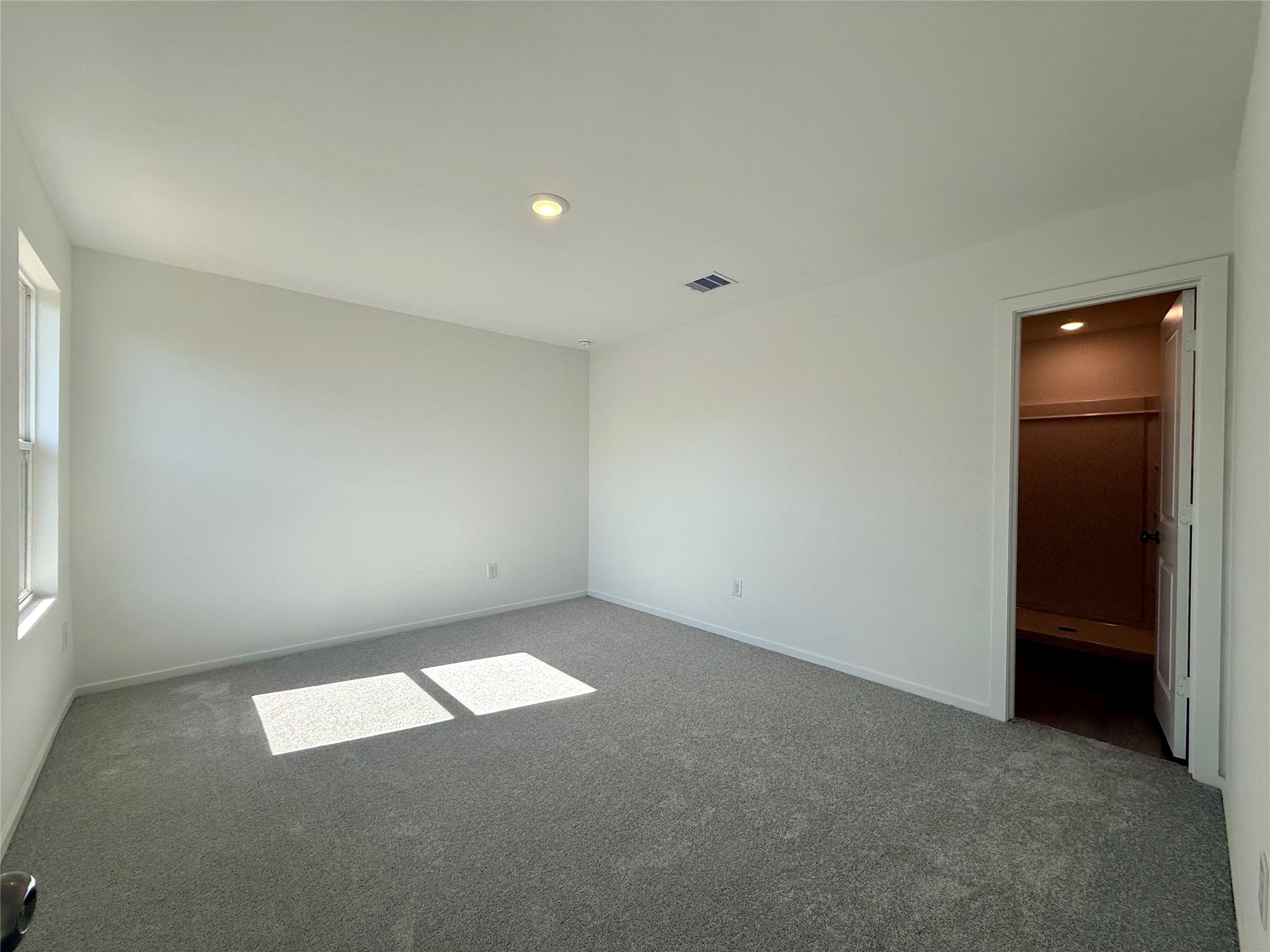 26707 Feather Reed Drive Katy, TX 77493 - Photo 13 of 18 an empty room with a empty space and window