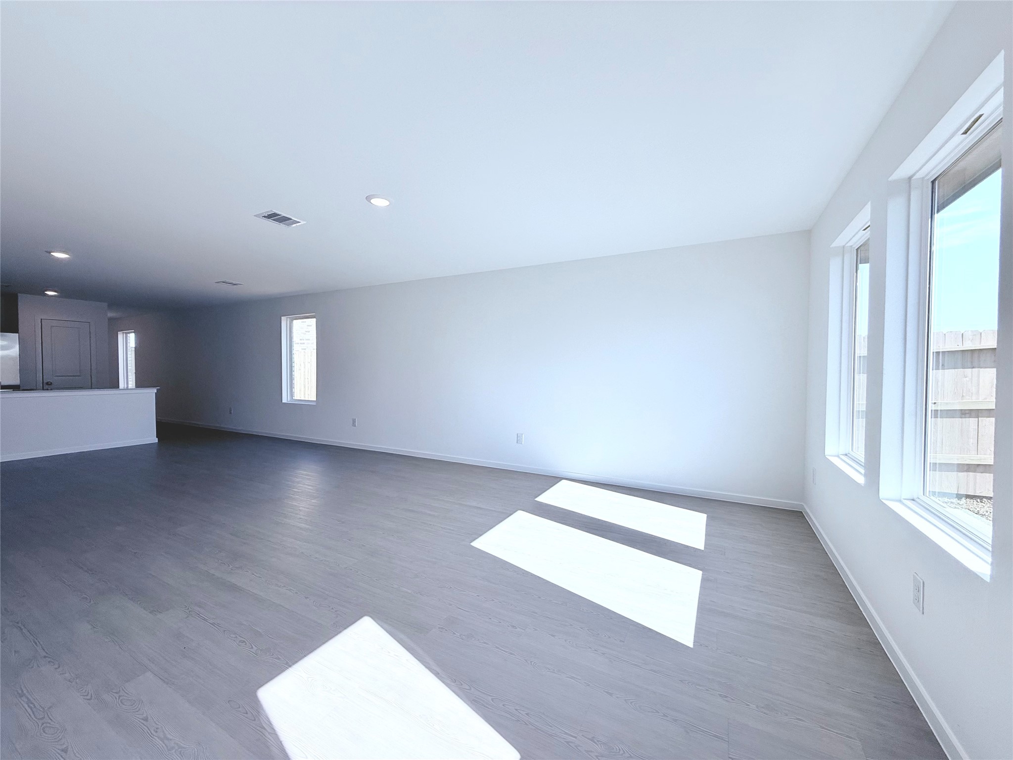 26707 Feather Reed Drive Katy, TX 77493 - Photo 16 of 18 an empty room with windows