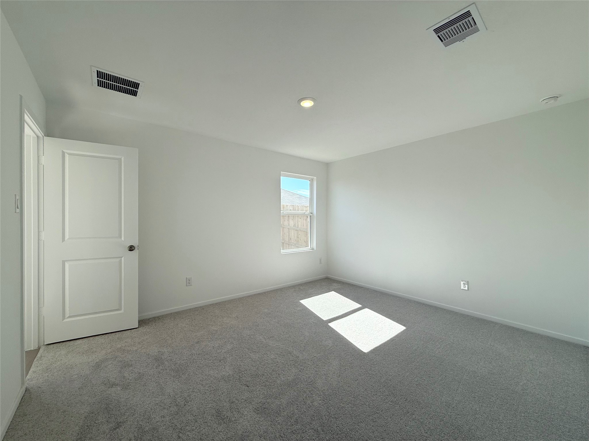 26707 Feather Reed Drive Katy, TX 77493 - Photo 17 of 18 an empty room with windows