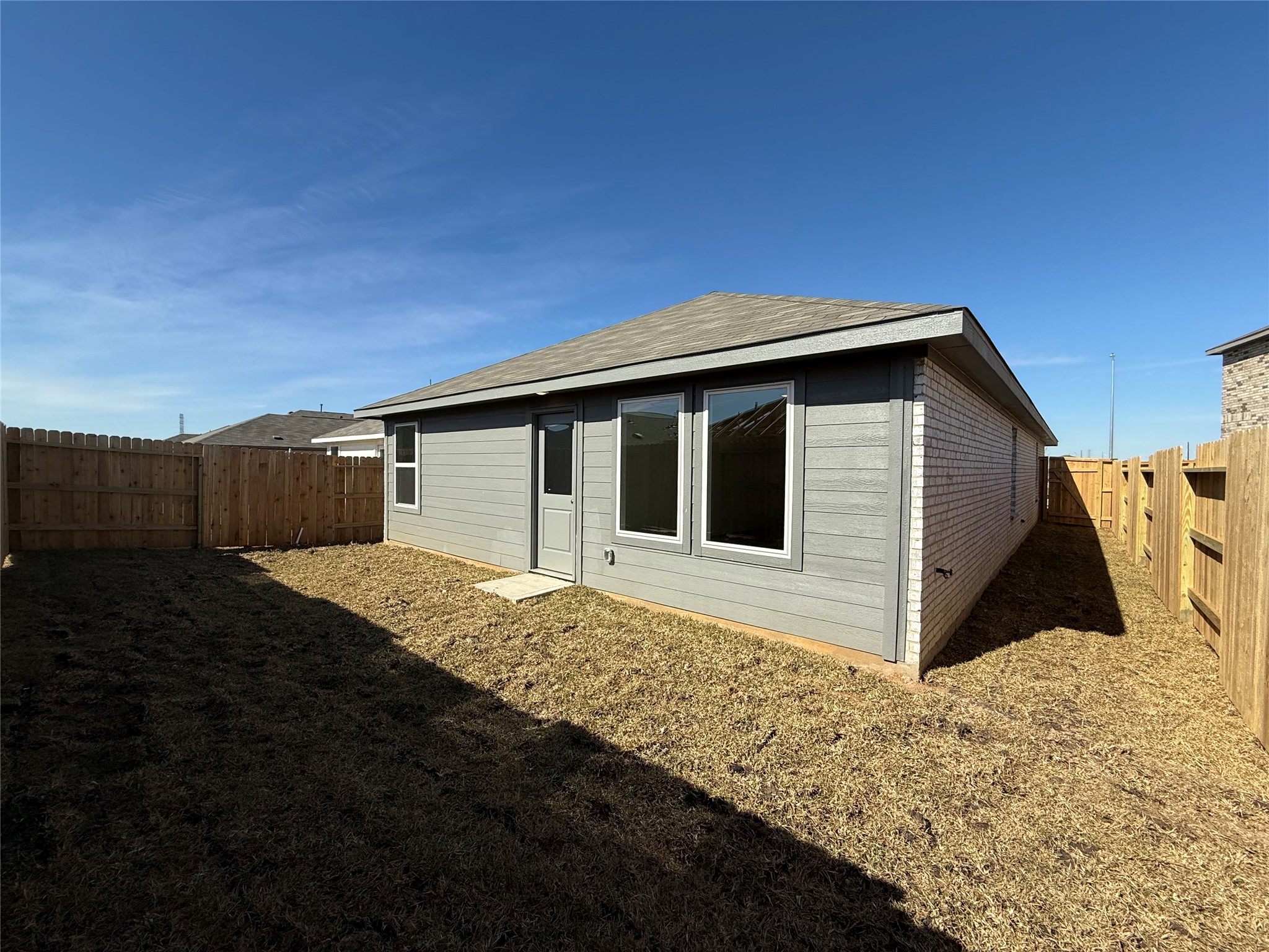26707 Feather Reed Drive Katy, TX 77493 - Photo 18 of 18 a house with wooden fence