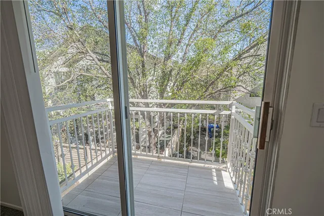 a view of a room with a large window
