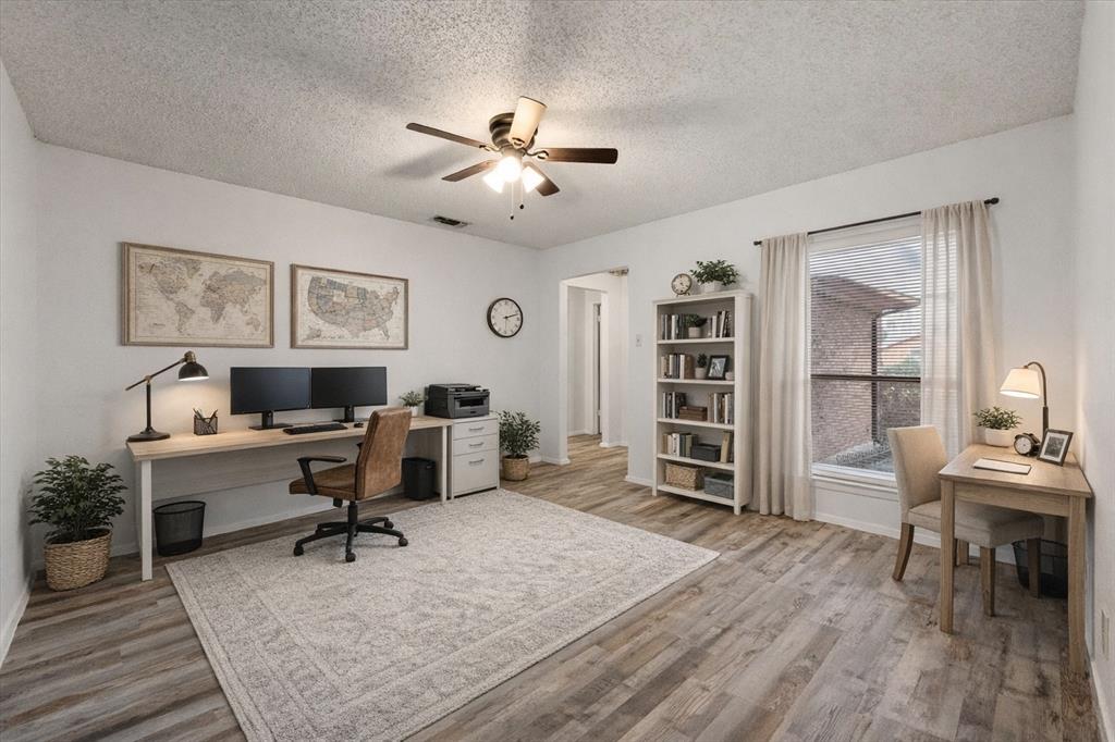 2305 Gilbert Circle Arlington, TX 76010 - Photo 3 of 38 a view of a livingroom with workspace and a window
