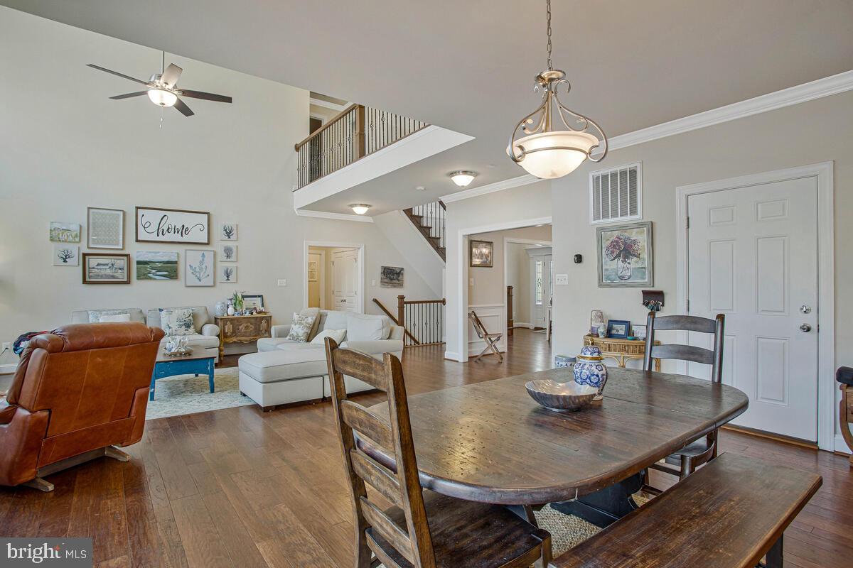 54 Simmons Ridge Road Prince Frederick, MD 20678 - Photo 17 of 55 a view of a dining room with furniture and wooden floor