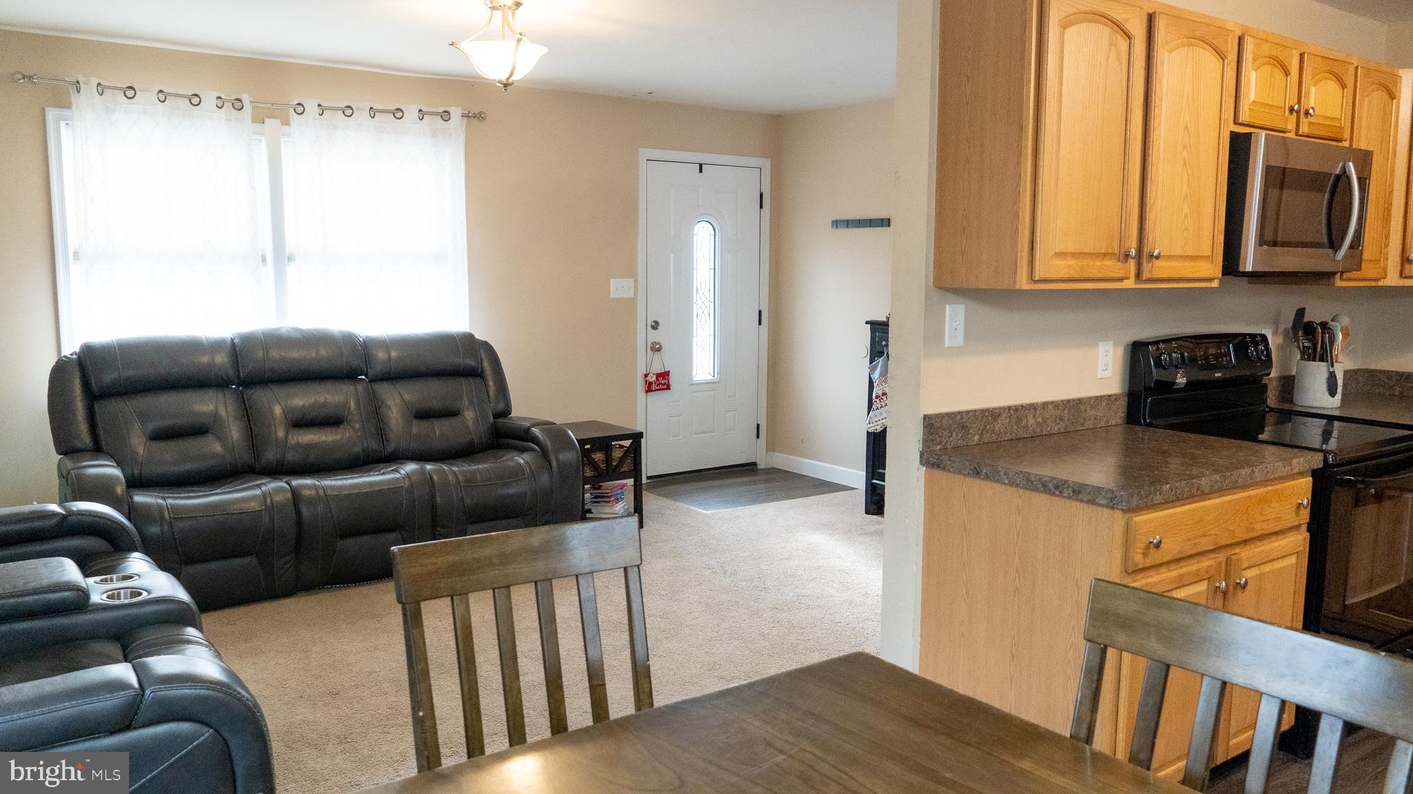 3705 Firetower Road Felton, DE 19943 - Photo 18 of 40 a living room with furniture and a window