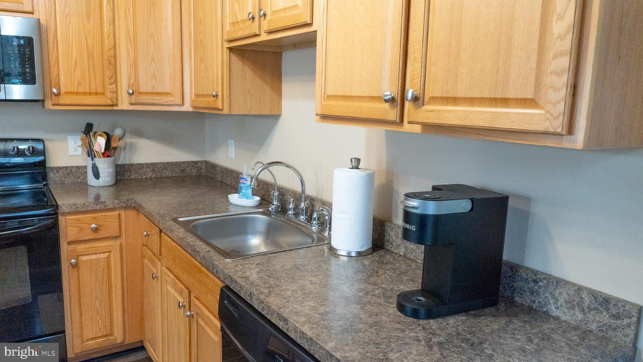3705 Firetower Road Felton, DE 19943 - Photo 20 of 40 a kitchen with sink and cabinets