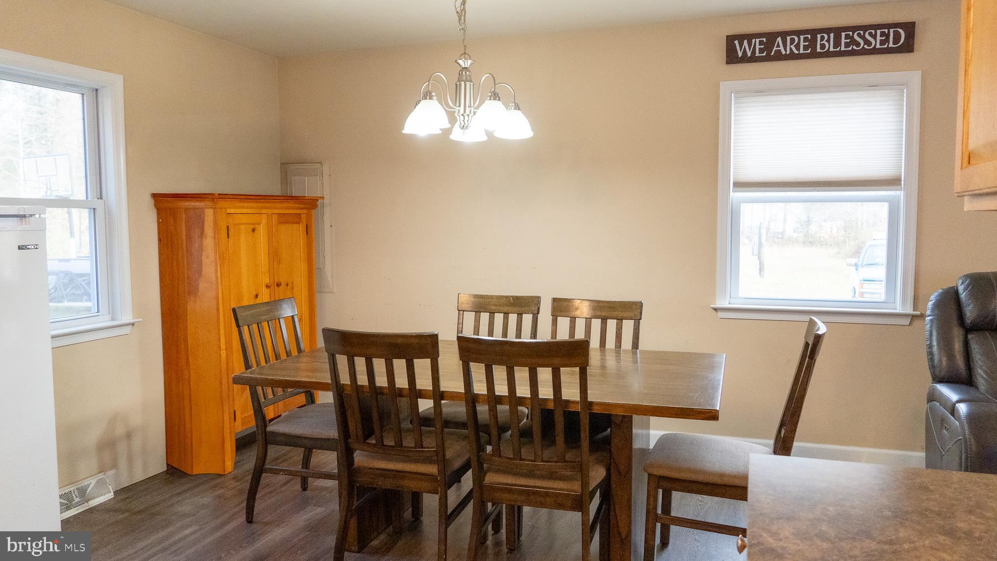 3705 Firetower Road Felton, DE 19943 - Photo 25 of 40 a view of a dining room with furniture and window