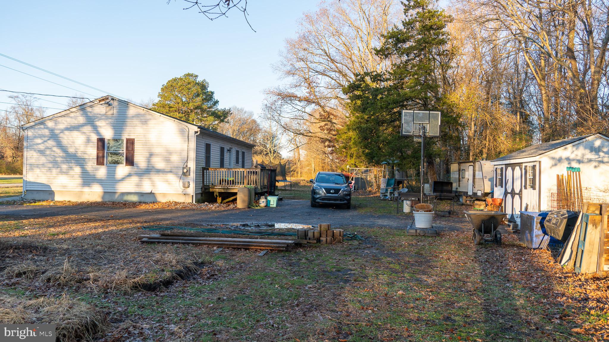 3705 Firetower Road Felton, DE 19943 - Photo 3 of 40 a view of a street with cars parked in front of it