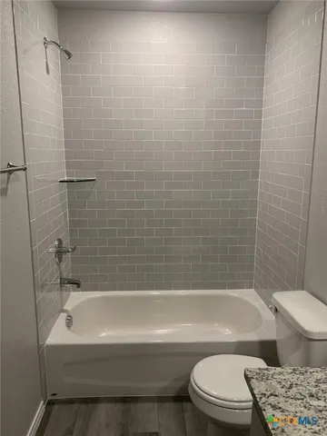 a view of small space with racks on the wall