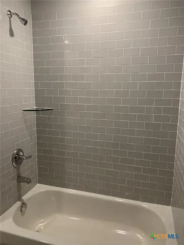 a bathroom with a bathtub