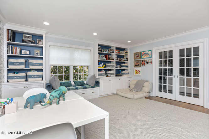 3 Owenoke Way Riverside, CT 06878 - Photo 14 of 33 a living room with furniture and a large window