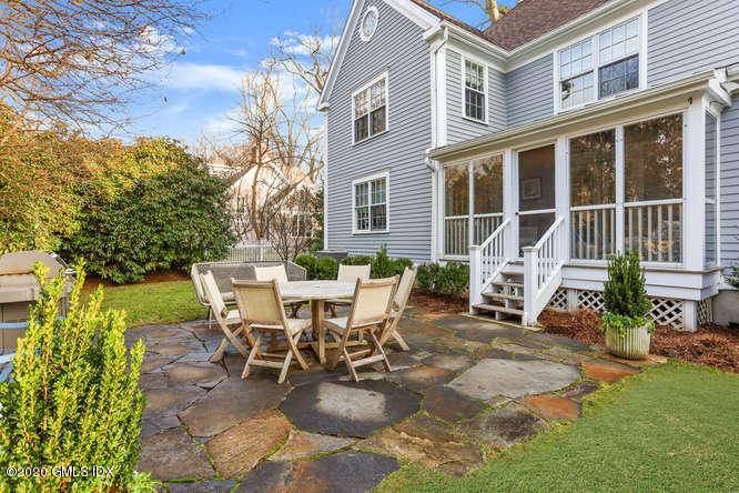 3 Owenoke Way Riverside, CT 06878 - Photo 28 of 33 a view of a house with backyard sitting area and garden