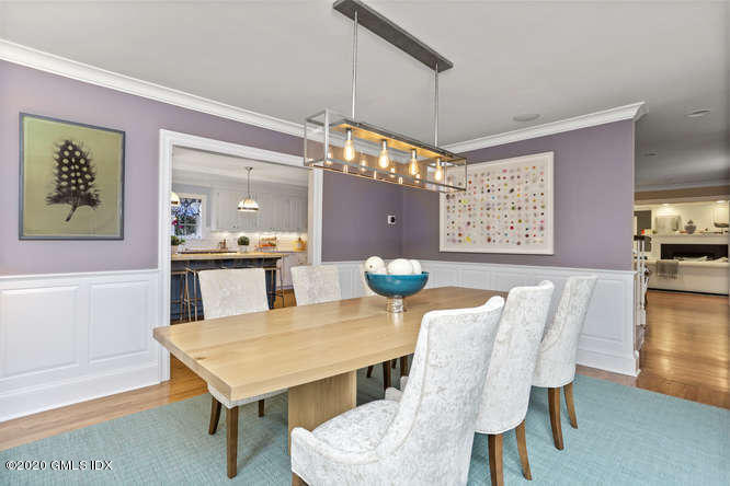 3 Owenoke Way Riverside, CT 06878 - Photo 4 of 33 a view of a dining room with furniture and wooden floor