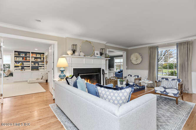 3 Owenoke Way Riverside, CT 06878 - Photo 10 of 33 a living room with furniture and a fireplace