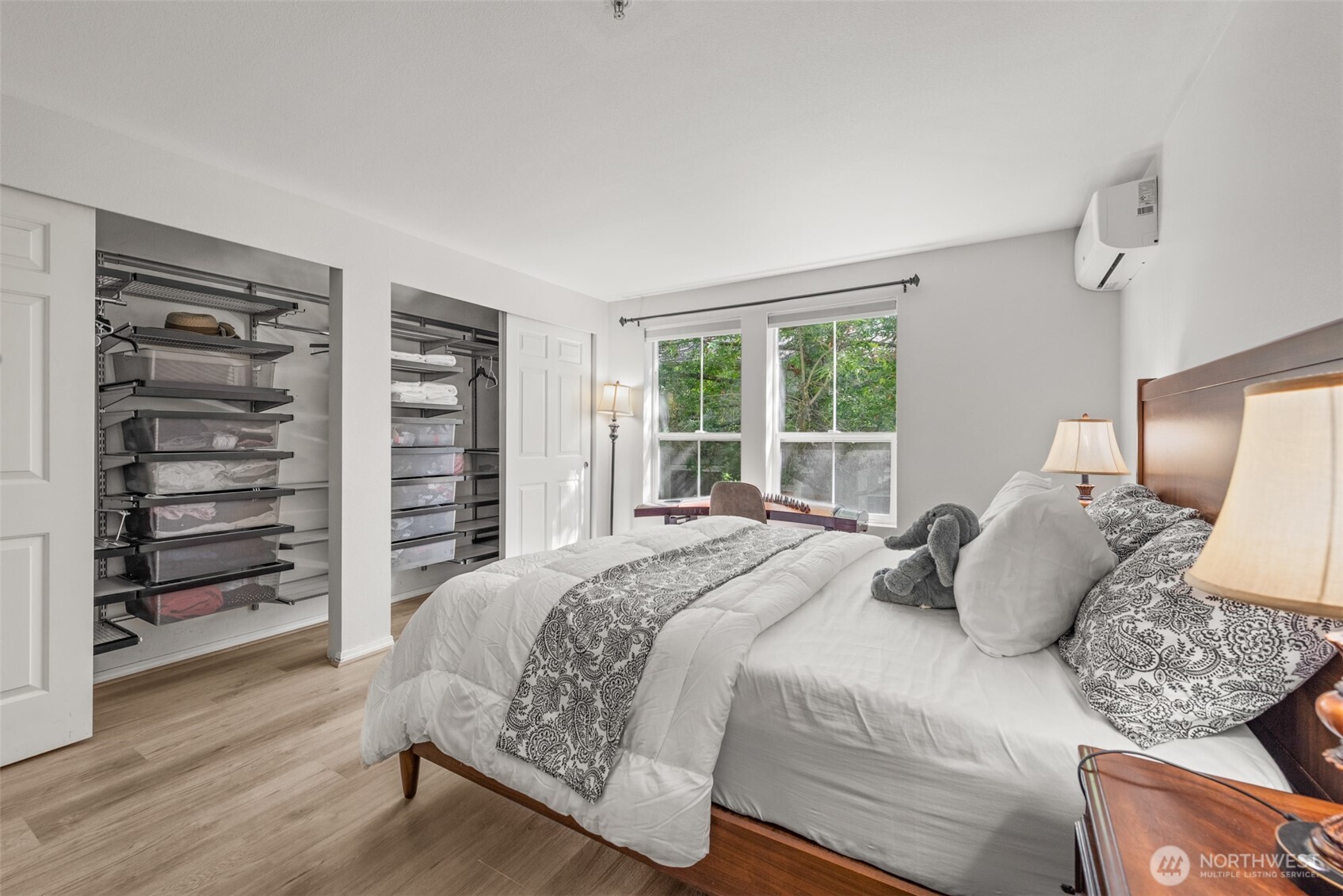 4423 249th Terrace Southeast Issaquah, WA 98029 - Photo 12 of 27 a bedroom with a large bed and a window