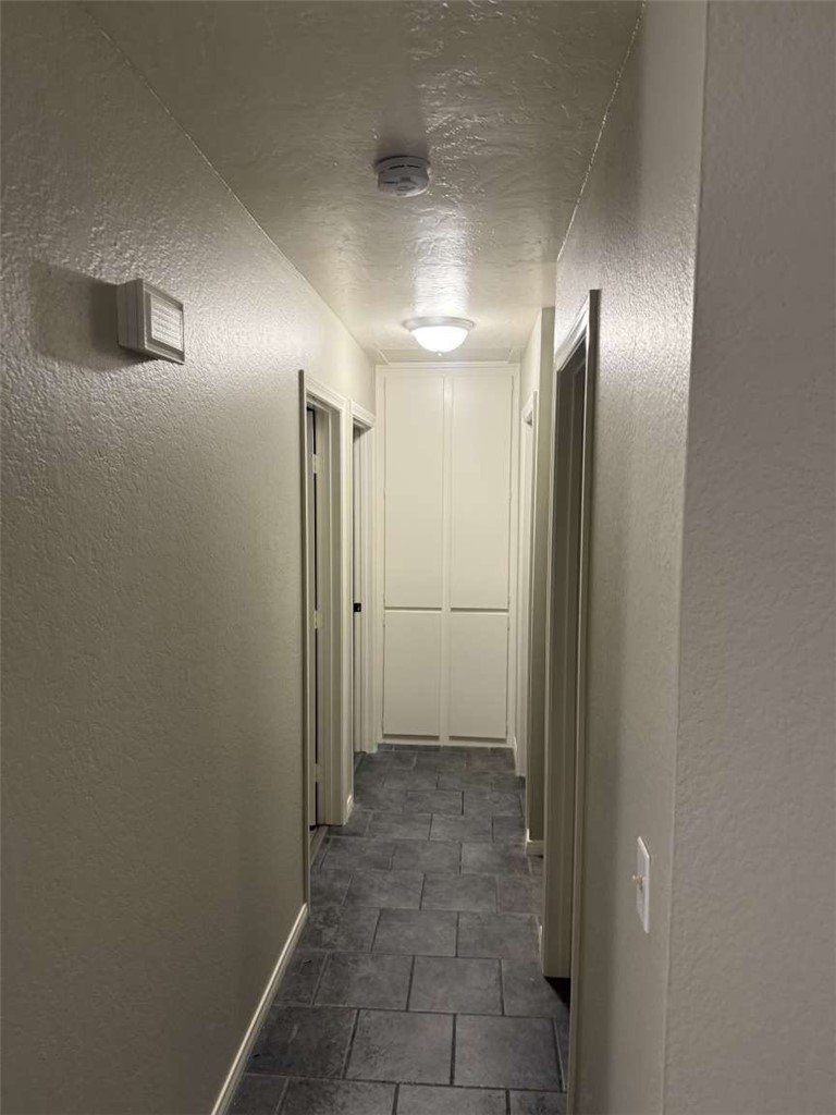 3270 Edgemont Court San Bernardino, CA 92405 - Photo 12 of 44 a view of a hallway