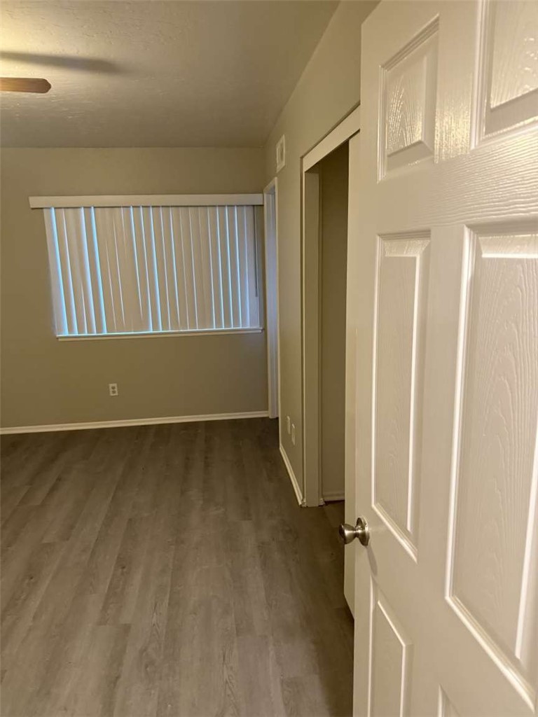 3270 Edgemont Court San Bernardino, CA 92405 - Photo 18 of 44 a view of a room with wooden walls