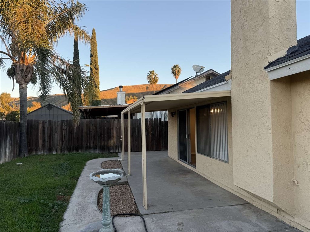 3270 Edgemont Court San Bernardino, CA 92405 - Photo 31 of 44 a view of a chair and tables in the patio