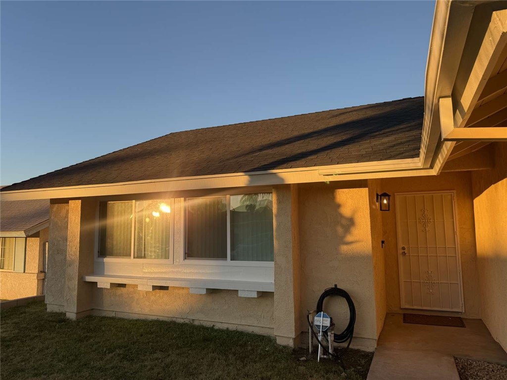3270 Edgemont Court San Bernardino, CA 92405 - Photo 39 of 44 a front view of a house with garden