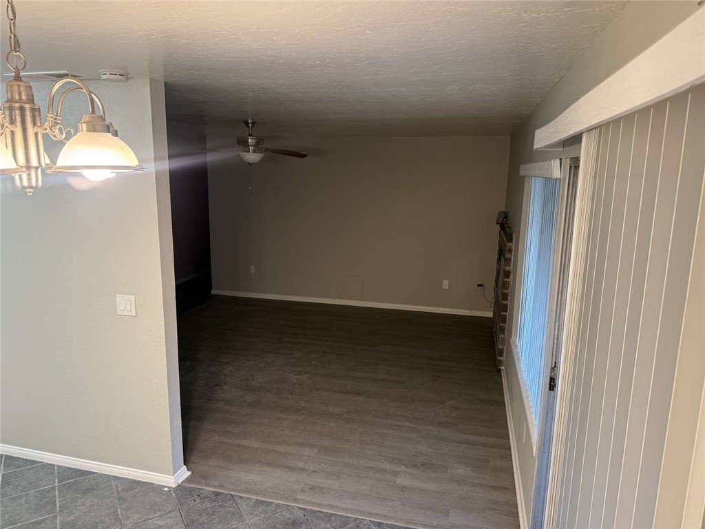 3270 Edgemont Court San Bernardino, CA 92405 - Photo 6 of 44 an empty room with windows