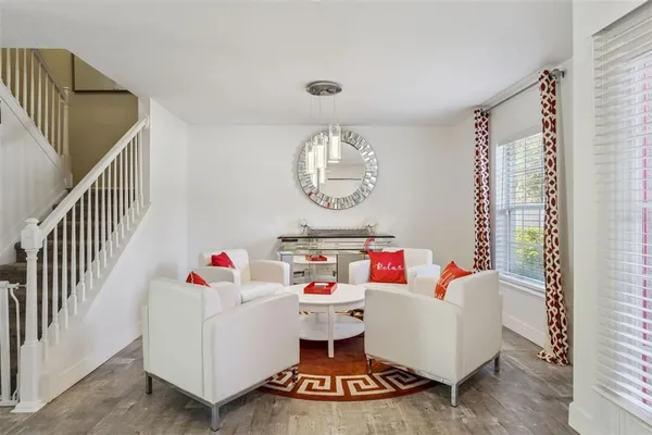 a very nice looking dining room with a table and chairs