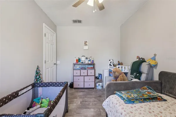 a bathroom with a sink a mirror and vanity